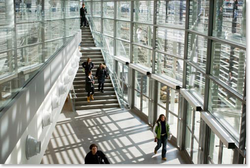 students in glass corridor